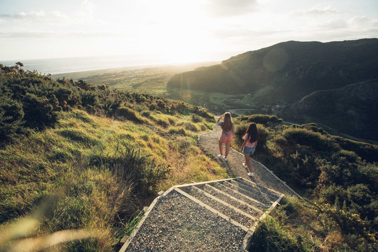 Two girls walking on a nature track