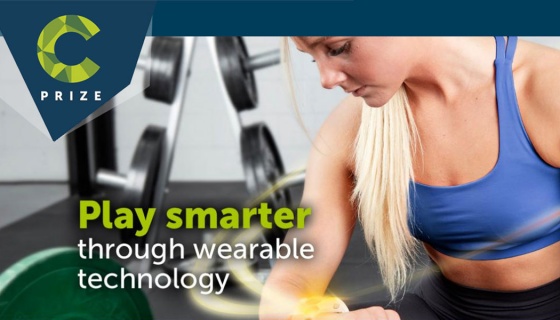 Play smarter through wearable tech - woman in gym with smart watch