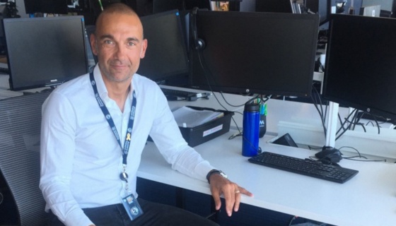 Antonio at his work desk